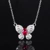 Otoño e invierno nueva joyería traje de joyería moda aretes de mariposa collar anillo rubí natural para mujer productos dulces