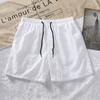 Shorts casuales de verano para hombre 2025 pantalones de color caramelo ropa de playa de comercio exterior para hombre venta al por mayor ropa para hombre transfronteriza