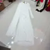 Vestido Tricotado Nanyou Europeu e Americano com Design de Xale Assimétrico, Vestido de Noite Vazado, Vestido Longo