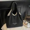 Bolso Texturizado Estilo Coreano Transfronterizo Estilo Perezoso 2025 Nuevo Gran Capacidad Casual Invierno Rayado Bordado Bolso de Hombro