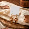 Aretes estilo Melard transfronterizos, aretes de resina ámbar, aretes geométricos vintage de carey color caramelo, aretes de mujer otoño/invierno
