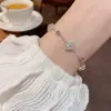 Pulsera de Flor de Cuatro Hojas con Microincrustaciones de Circonita, Estilo Francés de Lujo Ligero, Exquisita, a la Moda, Versátil, de Gama Alta, Joyería Súper Brillante al por Mayor