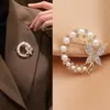 Versão coreana de broche de pérola e diamante de alta qualidade, moda, anti-luz, fivela de lenço de borboleta, pino fino de alta qualidade, atacado de vestuário