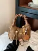 Bolso de diseño único para mujer, nueva colección otoño/invierno 2025, bolso de hombro retro casual, bolso tote y de axila versátil