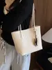 Bolso de mano tejido de patrón de nicho estilo coreano ins, bolso cesta de moda de gran capacidad, bolso de hombro y axila texturizado de moda