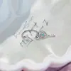 Nueva colección de serie de proteína azul de pendientes de acero de titanio médico, elegantes y versátiles, con diseños de trébol de cuatro hojas y cruz