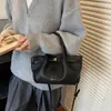 Moda Transfronteriza Primavera 2026 Nuevo Bolso de Hombro Versátil con un Toque de Lujo, Diseño de Nicho, Bolso de Mano y Bolso Cruzado para Mujer
