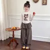 Conjunto de Camiseta de Manga Larga con Dibujos Animados y Pantalones de Pierna Ancha para Niñas, Nuevo Estilo 2026, Casual y Moderno para Niños Mayores