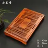 Conjunto de chá Kung Fu com bandeja de drenagem tipo gaveta, uma mesa de chá de madeira maciça para uso doméstico e uma bandeja de chá para guardar folhas de chá