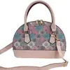 Bolso de concha de nicho estilo francés vintage para mujer, Nuevo de moda 2025 estilo Hong Kong material de retazos bolso de hombro y cruzado para mujer