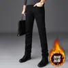 Jeans masculinos de Hong Kong 2026 outono preto slim fit stretch perna reta versátil casual de negócios calças compridas