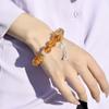 Diseño original pulsera de cristal torre amarilla pulsera de cristal amarillo libro rojo pequeño cuerda de mano que tiembla suministro al por mayor