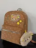 Mochila Marca Oso Viento Soleado Caramelo Estrella Estilo Chica Dulce Coreana Retro Café con Leche Salida Diaria Pequeña Linda Versátil