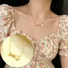 Colar de aço titânio não desbota feminino luxo leve pingente de pérola sorriso corrente clavícula estilo celebridade da internet acessório de pescoço personalizado moderno