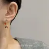 Pendientes Asimétricos de Estrella con Borla de Campana Navideña Pendientes Dulce Atmósfera Festiva Pendientes de Diseño Nicho para Mujer