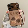 La funda de trébol de cuatro hojas Yue Yue Shun es adecuada para el estuche del teléfono Apple 17pm, iPhone 15 de silicona, 16 con cordón, 14 con ventana de visualización grande