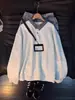 Sudadera de cuadros tipo patchwork estilo americano, imitación de dos piezas para hombre, marca nueva y moderna, diseño holgado, top versátil con cuello polo, moderno