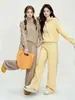 Conjunto casual de punto de color liso para mujer, nueva colección otoño/invierno 2026, con un suéter de media cremallera y pantalones de pierna ancha de cintura alta, un conjunto de dos piezas