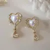 Pendientes de Amor de Perla Retro Franceses Simples Transfronterizos Lujo Ligero Nicho Elegante Diseño de Alta Gama Pendientes Colgantes de Gota de Agua