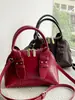 Shuai Mi Jia Simple Retro Casual 2026 Verano Nuevo Bolso Cruzado de Hombro Único con Forma de Concha para Mujer