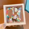 Pulsera nueva para niños 2024 anillo lindo para niña pequeña clip para la oreja de dibujos animados para bebé niña traje de joyería para niña venta al por mayor