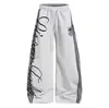 Pantalones deportivos de chándal de pierna ancha, modernos y elegantes, para jazz y street dance, para hombres y mujeres, holgados y versátiles, con cordón y estampado de tótem, pantalones largos de dobladillo curvo