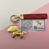 Shuibeizijin 999 Llénalo de Dinero Inmediatamente Llavero Dorado Colgante para Bolso de Teléfono Móvil Colgante del Año del Caballo Regalo Tienda de Oro Regalo