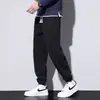 Calça de Moletom Esportiva para Homens Primavera e Outono 2026 Outono Novo Calça Jogger Casual Solta Calça Masculina Versátil com Forro de Lã e Tecido Espessado