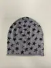 2026 Nuevo Modelo Gorro Holgado con Estampado de Pentagrama Grande Versátil Súper Rejuvenecedor Gorro de Punto con Borde Enrollado para Mujer en Otoño e Invierno