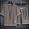 Traje casual deportivo tipo waffle para hombre en stock al por mayor estilo Hong Kong holgado talla grande falso de dos piezas manga corta shorts