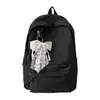 Nova mochila de moda em relevo de grande capacidade estilo ins, simples e versátil, adequada para estudantes do ensino fundamental, médio e universitário