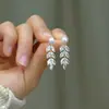 Nuevos y exquisitos aretes de borla de espiga de trigo con perlas artificiales para mujer, aretes elegantes de lujo ligero de alta gama, accesorios de aretes simples de nicho