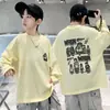 Camiseta de Manga Larga Nueva para Niños de Primavera y Otoño Marca de Moda Holgada Estampada Nuevo 2026 Niños Medianos y Grandes Versátil Camiseta Base T