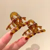 Pinza de pelo pequeña con garra para temperamento de princesa, pinza de pelo lateral estilo coreano exquisita, sensación de alta gama, nuevo pinza de pelo para media coleta 2026