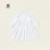 Primavera/Outono 2026 Novo Vestido Branco para Meninas Mangas Bufantes Gola Alta Vestido Camisa Roupa Íntima Camisa de Boneca Roupa Infantil Estilosa