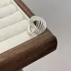 Anillo de Alambre de Plata Multicapa Trenzado 3D Estilo Coreano Simple Versátil Apilable para Mujer, Moda de Lujo Ligero Primavera/Verano 2026