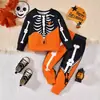 Ropa de dormir de dos piezas para niños, estilo europeo y americano, para primavera y otoño, con estampado de calaveras para Halloween, manga larga y pantalón largo, ropa para niños Ins