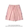 Escape da Terra Shorts Brancos Feminino Verão 2022 Moda Soltos Esportivos Calça de Cinco Pontos Cintura Alta Finos