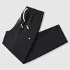 Calças largas de trabalho para casal para primavera e outono, calças impermeáveis retas para atividades ao ar livre, calças casuais largas unisex com múltiplos bolsos