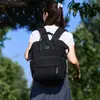Nueva mochila de moda transfronteriza para mamás con gran capacidad, resistente al agua, separación de húmedo y seco, almacenamiento simple para madres y bebés