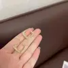 Anillo de Cristal Cuadrado Doble Capa Simple de Corea del Sur Elegante Nicho Sentido de Diseño de Alta Gama Moda Pendientes de Viento Frío para Viajeros