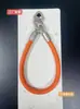 Nova pulseira de couro triangular com fivela dupla para celular, acessório universal, pulseira simples com fivela dupla, corrente de suspensão anti-queda