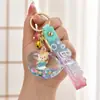 Llavero con Arena Líquida en Botella de Aceite, Botella que Brilla en la Oscuridad, Llavero de Ballena, Colgante Exquisito para Bolso, Lindo Accesorio para Llavero
