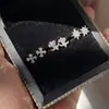 Pendientes de aro Europa y Estados Unidos Ins a estilo simple Joker pendientes de pareja para hombres y mujeres joyería al por mayor palabra de arroz estrellas nocturnas
