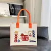 Bolsa de fieltro de gran capacidad, bolso de mano Ruyi de caqui, moda para mujer, bolsa de mano portátil versátil para el trabajo y los desplazamientos