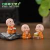 Micro-paisaje creativo travieso cuatro no Zen pequeño monje accesorios de decoración pequeño monje novicio coche escritorio mesa de té pequeños adornos