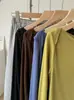 Top de Manga Larga Lyocell Tencel Lana Cuello Barco Capa Base para Mujer 2026 Otoño Estilo Coreano Elegante Top de Capa Base de un Hombro