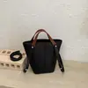 Bolso de mujer con patrón de lichi 2026 nuevo otoño de alta gama vintage para el trabajo bandolera cruzada bolso tipo cubo
