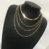 Europa y Estados Unidos joyería nueva transfronteriza creativa simple cadena de serpiente plana multicapa mezcla personalidad cadena collar para clavícula venta al por mayor
