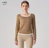 Camiseta de manga larga ajustada con bloques de color transfronteriza europea y americana para mujer, adecuada como prenda interior para Pilates, deportes, fitness y yoga